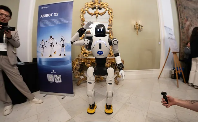 An AgiBot X2 humanoid robot presented at Mobile World Congress 2026