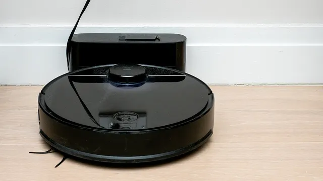 A Roborock robot vacuum on its charging dock