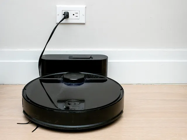 A Roborock robot vacuum on its charging dock