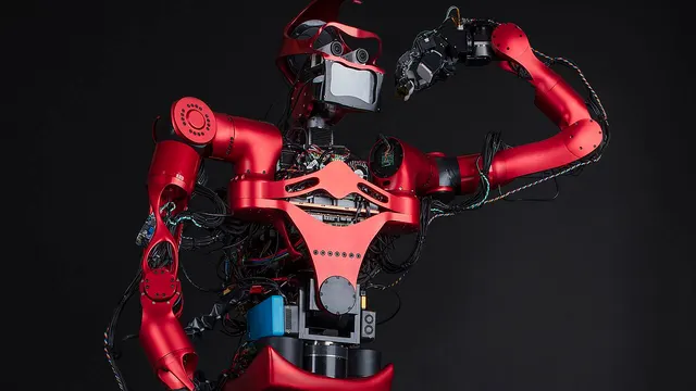 A life-size black humanoid robot.