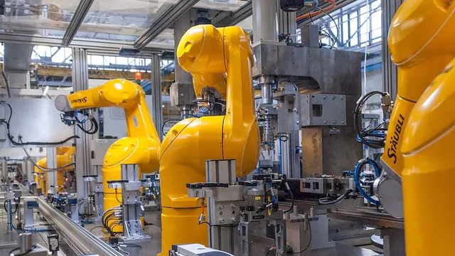 Stäubli industrial robots on a production line