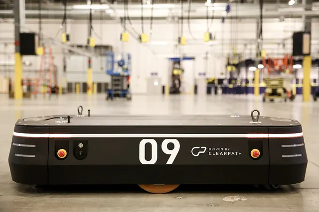 An autonomous mobile robot for carrying heavy loads in factories and warehouses