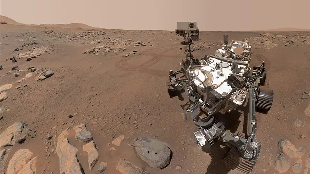The Perseverance rover photographed by its own camera near a drilled rock on Mars